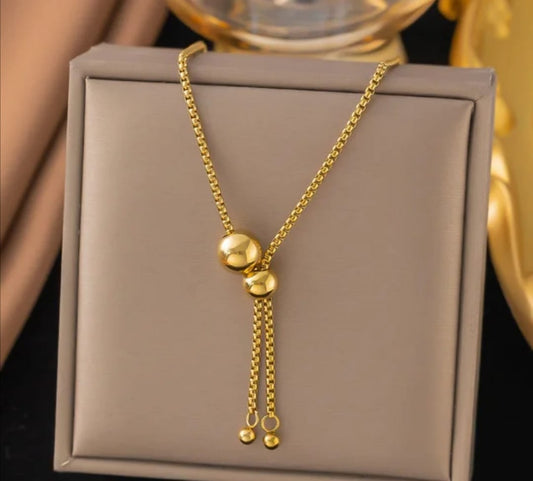 STAINLESS STEEL- GOLD PLATED NECKLACE WITH 4 BALLS